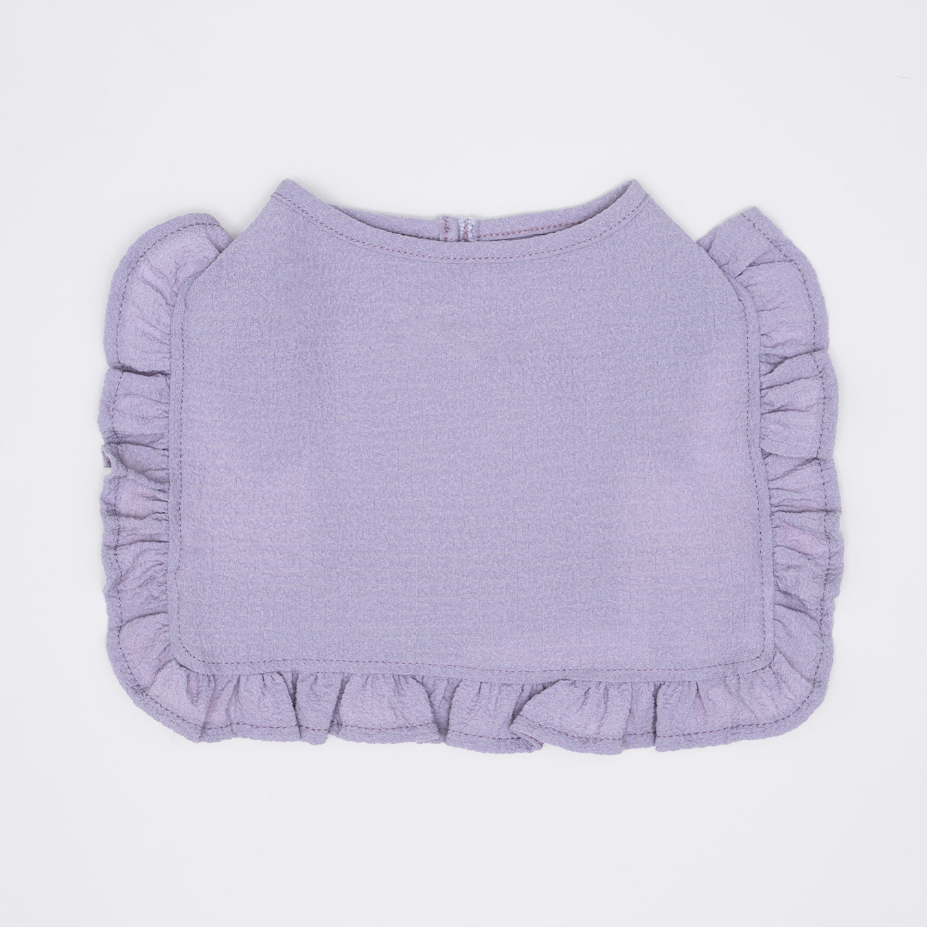Lilac tank top vest made with lightweight, breathable fabric and ruffled detail around the edges. Adjustable Velcro waist opening for the optimal fit. Featuring a pocket for our Rounder Ice Pack to keep your pets cool from the summer heat.